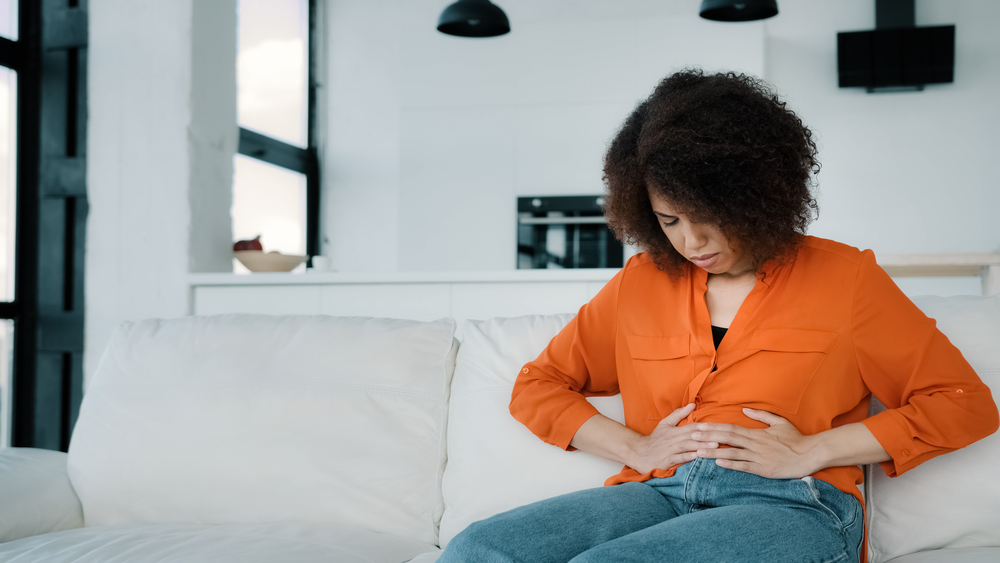 Unhappy Woman with Digestive problems