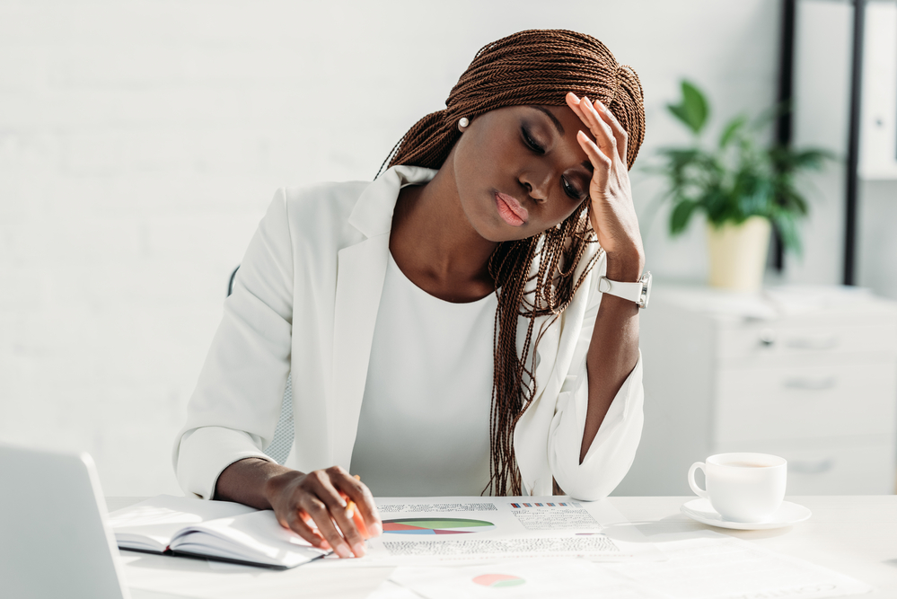 Tired woman at the office