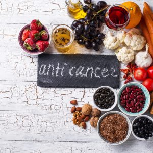 Cancer fighting products. Food for healthy life. Fruits, vegetables, beans, green tea and red wine